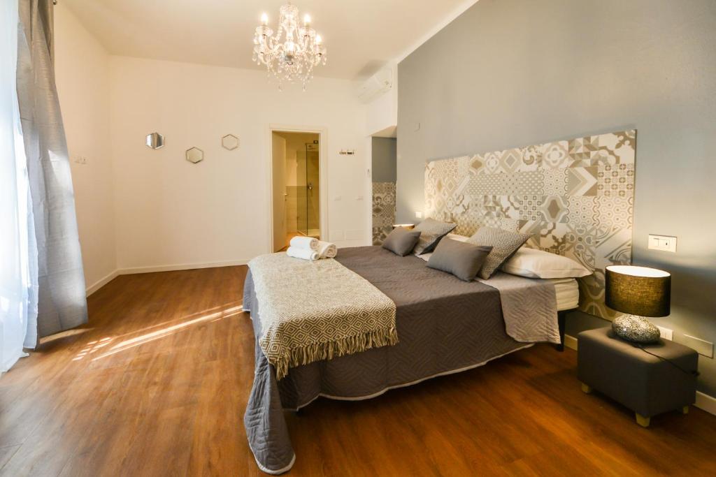 Postel nebo postele na pokoji v ubytování Casa Ferrovieri
