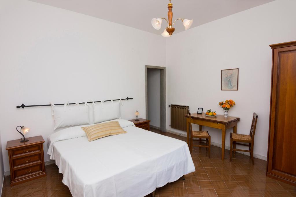 Postel nebo postele na pokoji v ubytování Casa Maresca Residence
