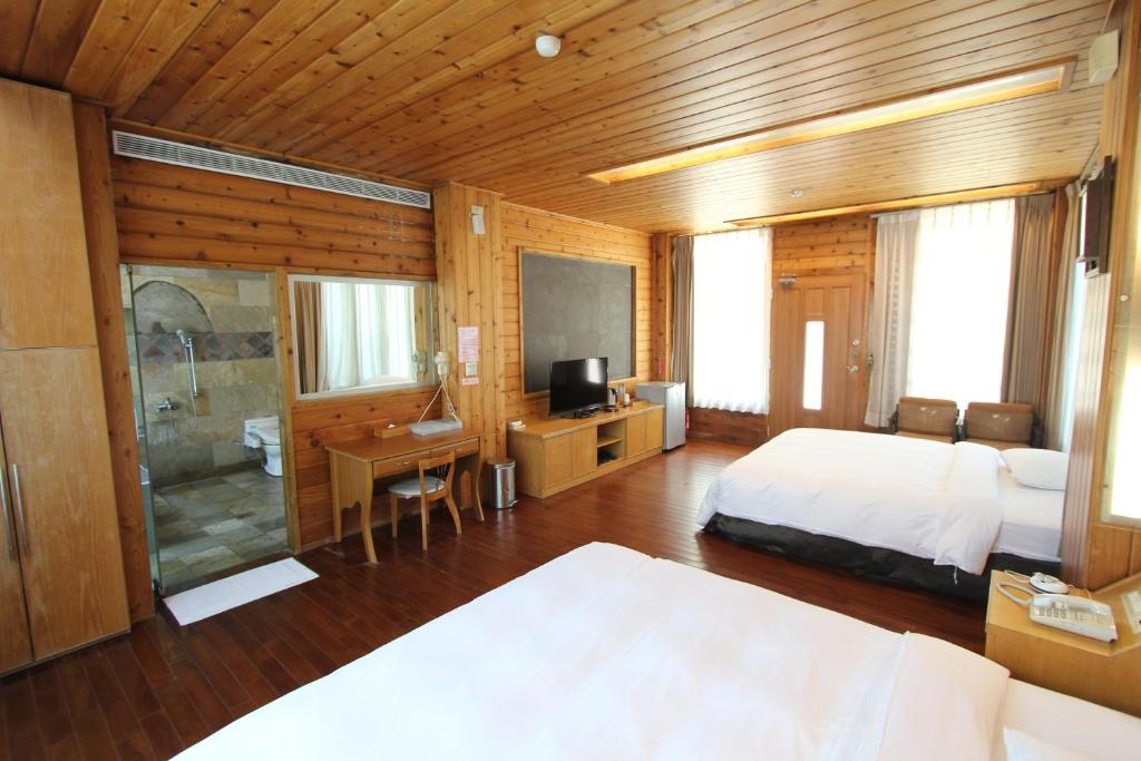 Postel nebo postele na pokoji v ubytování Pei Kong Creek Resort