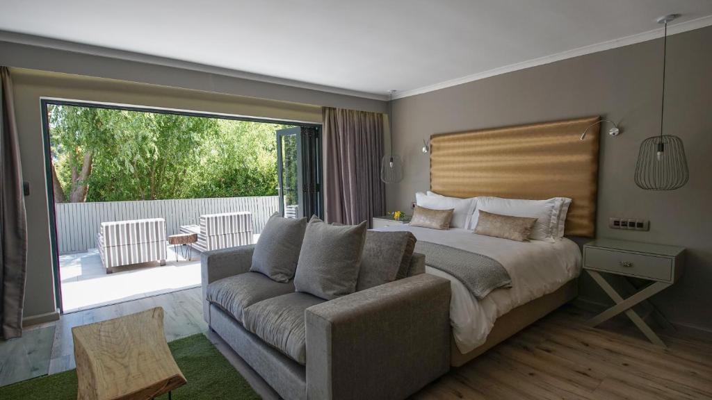 Postel nebo postele na pokoji v ubytování Silver Forest Boutique Hotel and Spa