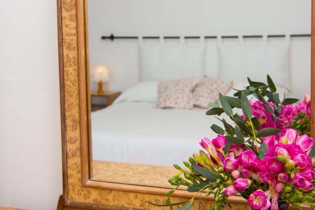 Postel nebo postele na pokoji v ubytování Casa Maresca Residence