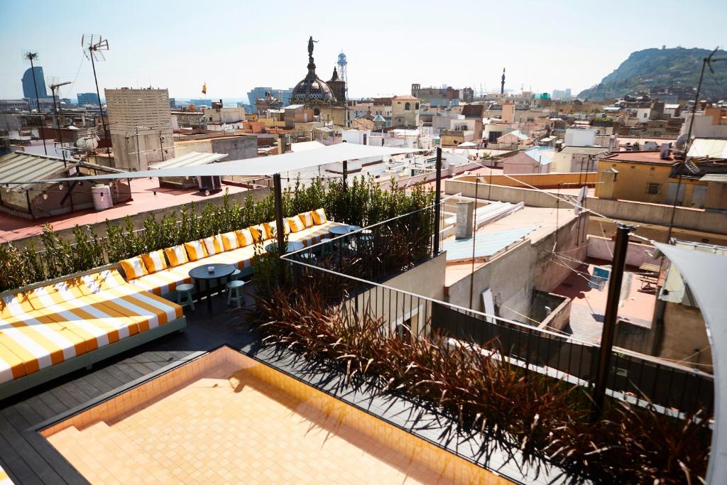 a view of a city from the roof of a building at Wittmore Hotel GL- Adults Only, Small Luxury Hotels in Barcelona