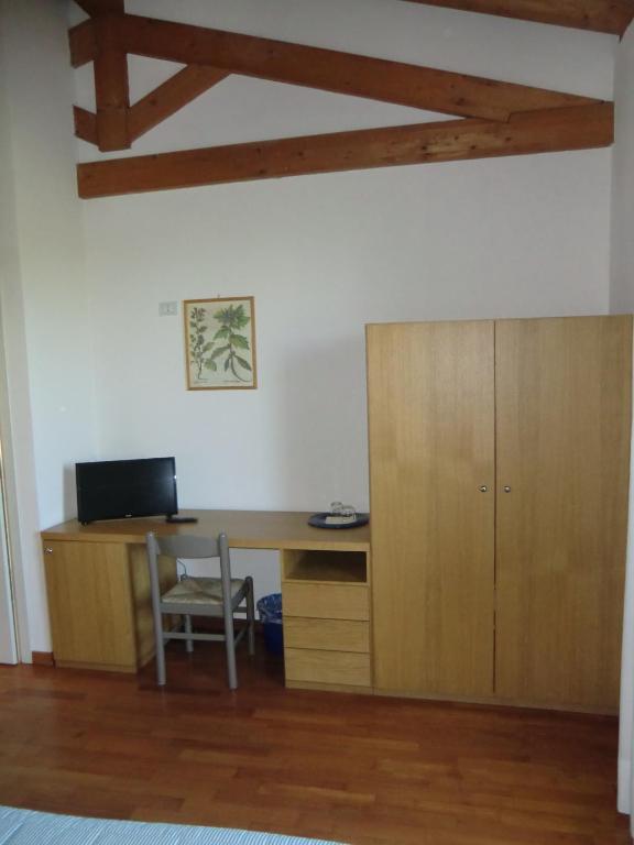 TV a/nebo společenská místnost v ubytování B&B Armonia