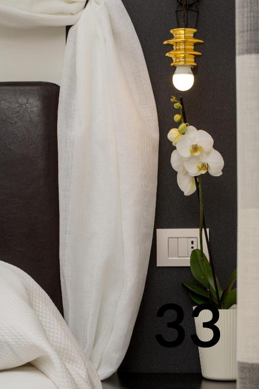 A bed or beds in a room at Ciao Bella Apartment