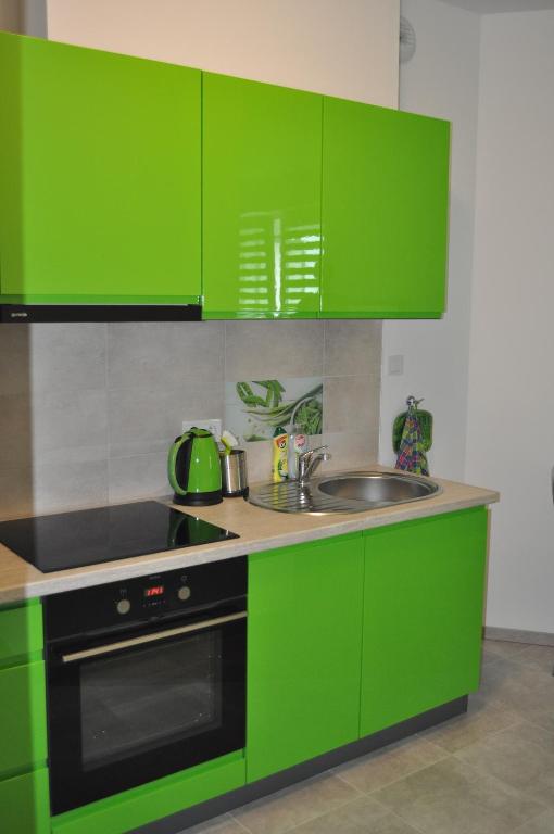 Kuchyňa alebo kuchynka v ubytovaní Pop Art Apartments