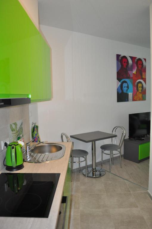 Kuchyňa alebo kuchynka v ubytovaní Pop Art Apartments