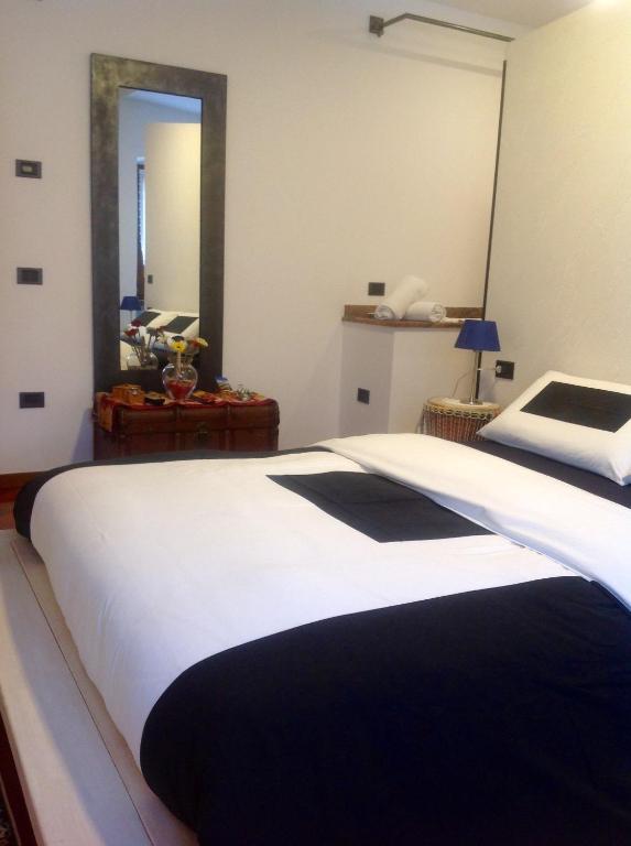 Postel nebo postele na pokoji v ubytování Guest House Santiago
