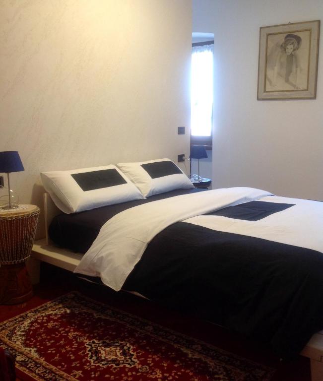 Postel nebo postele na pokoji v ubytování Guest House Santiago