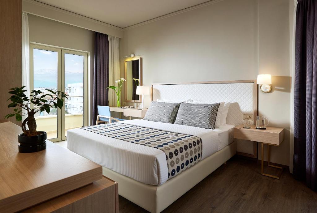 Postel nebo postele na pokoji v ubytování Irida Hotel