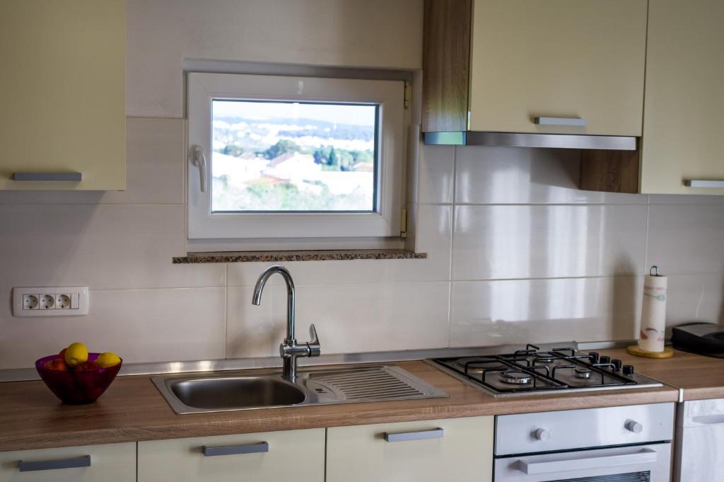 Kuchyňa alebo kuchynka v ubytovaní Apartment Verunica
