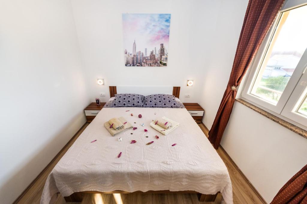 Posteľ alebo postele v izbe v ubytovaní Apartment Verunica