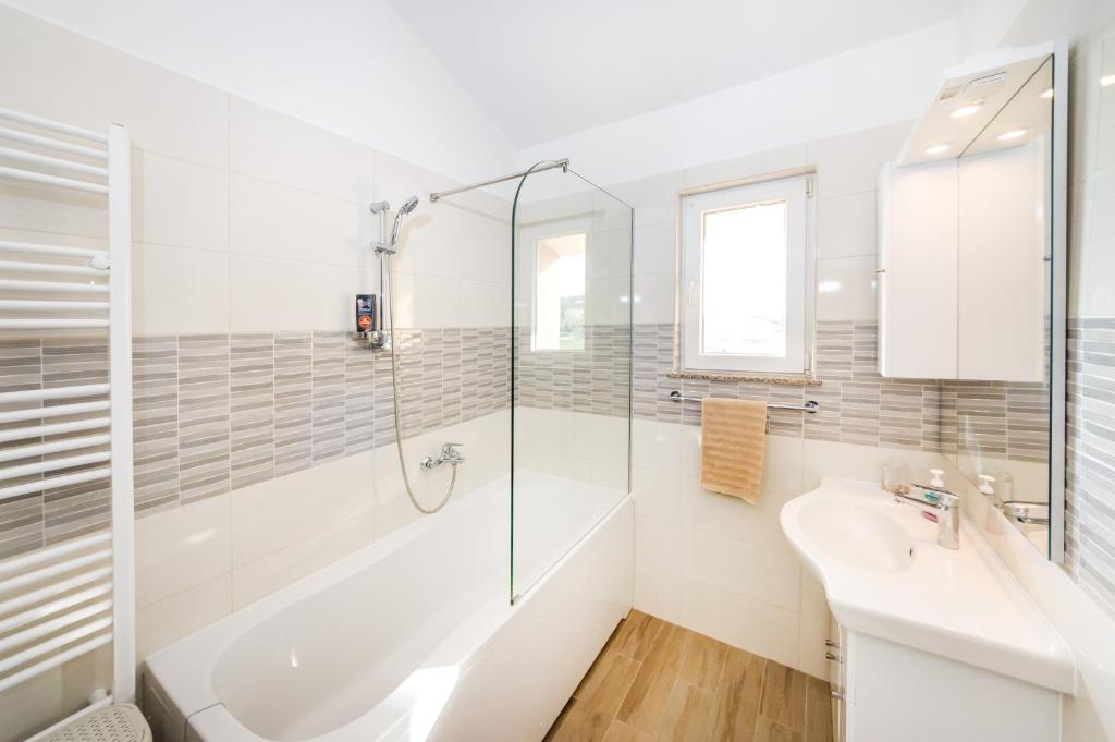 Kúpeľňa v ubytovaní Apartment Verunica