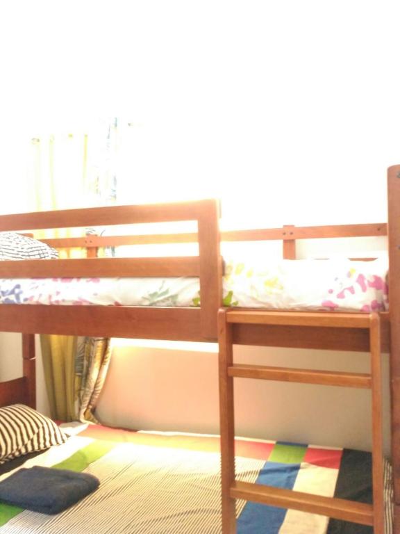 Postel nebo postele na pokoji v ubytování 2 BR Sorrento Oasis