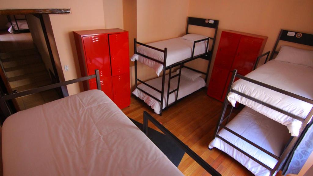 Postel nebo postele na pokoji v ubytování Huasi Lodge