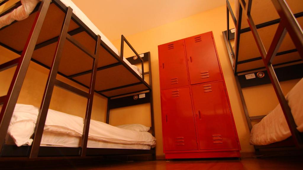 Postel nebo postele na pokoji v ubytování Huasi Lodge