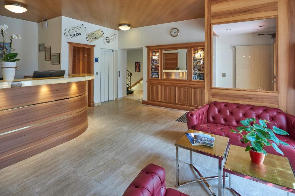 Posezení v ubytování Hotel Ambassador