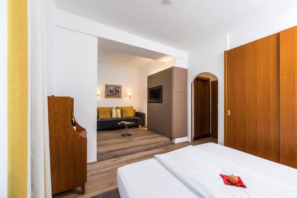 Postel nebo postele na pokoji v ubytování Hotel Goritschnigg
