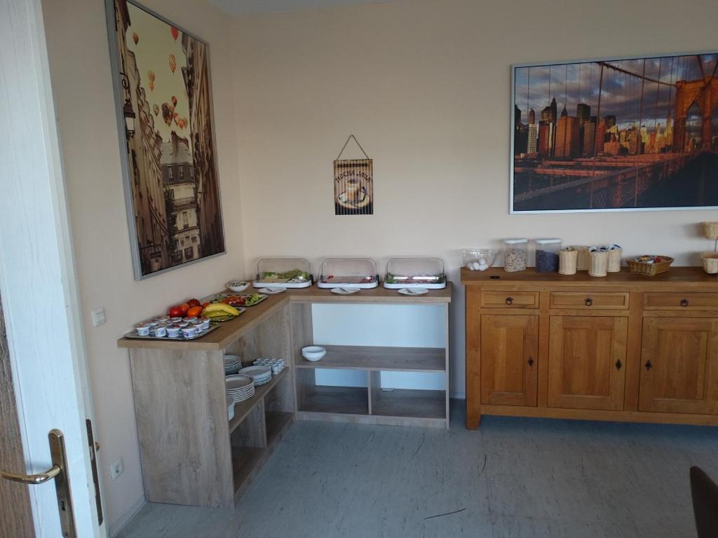 Kuchyň nebo kuchyňský kout v ubytování Hotel Amy