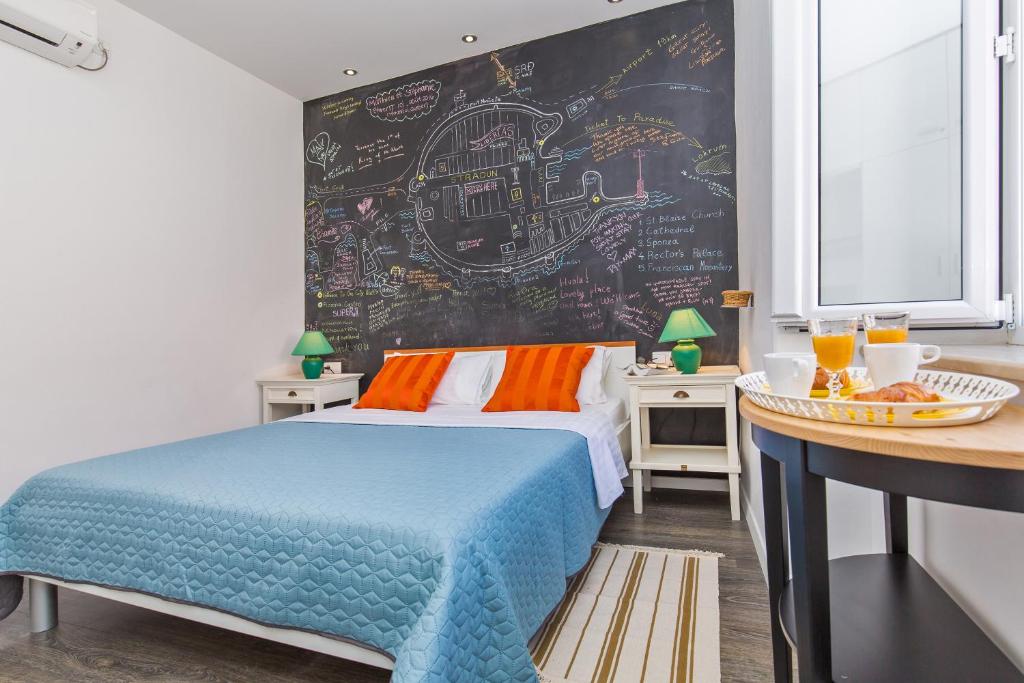 Posteľ alebo postele v izbe v ubytovaní Apartment & Room Joy
