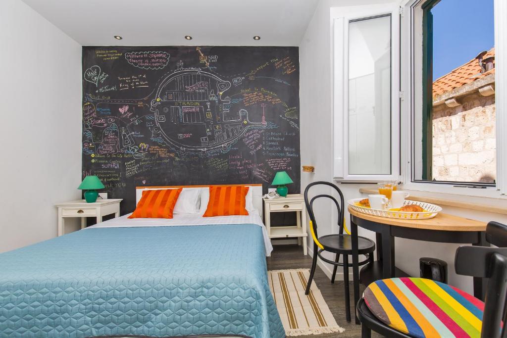 Posteľ alebo postele v izbe v ubytovaní Apartment & Room Joy