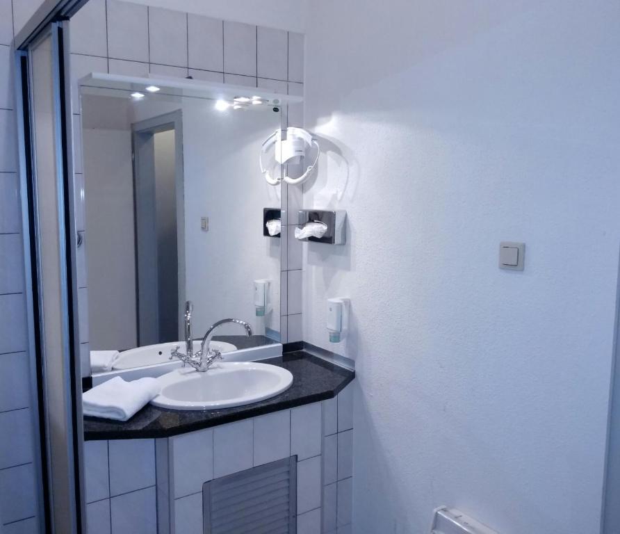 Koupelna v ubytování Wasserturm Hotel Mannheim