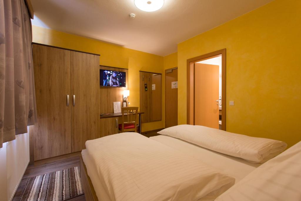 Postel nebo postele na pokoji v ubytování Hotel Freiensteinerhof Superior
