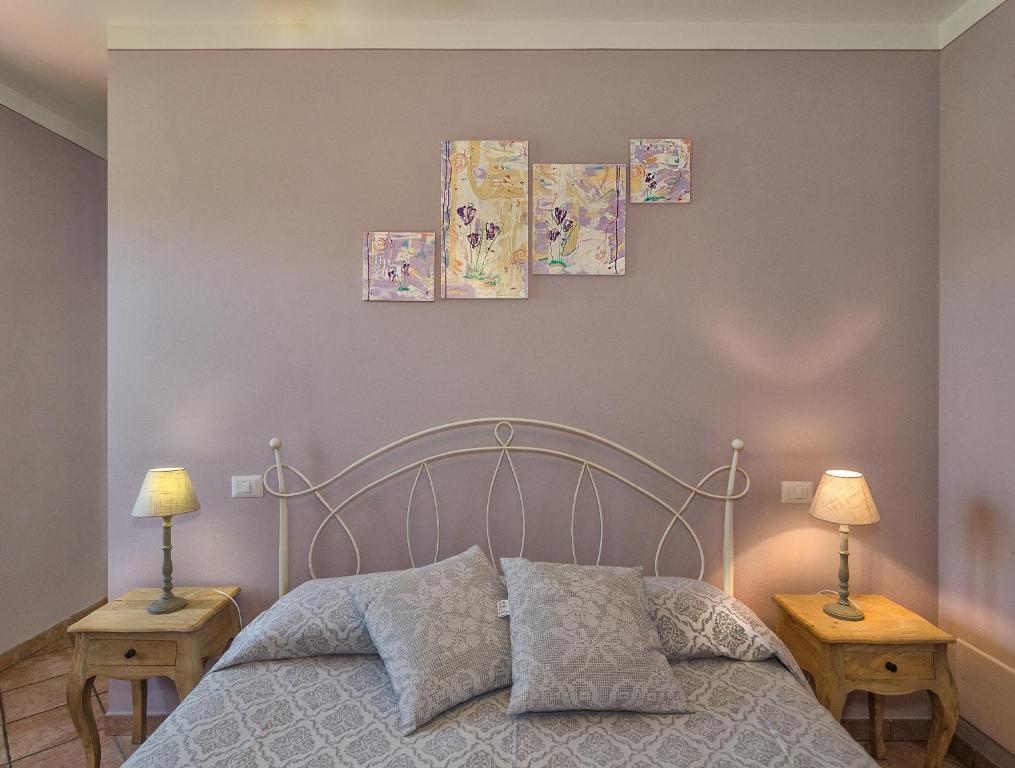 Postel nebo postele na pokoji v ubytování Agriturismo Ai Linchi