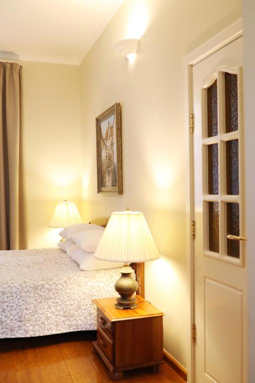 Postel nebo postele na pokoji v ubytování Old Riga Boutique Hotel "Vecriga"