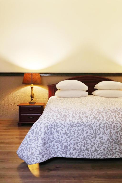Postel nebo postele na pokoji v ubytování Old Riga Boutique Hotel "Vecriga"
