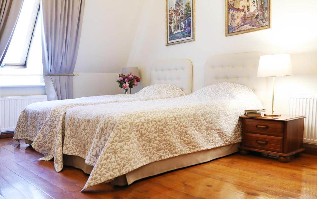Postel nebo postele na pokoji v ubytování Old Riga Boutique Hotel "Vecriga"