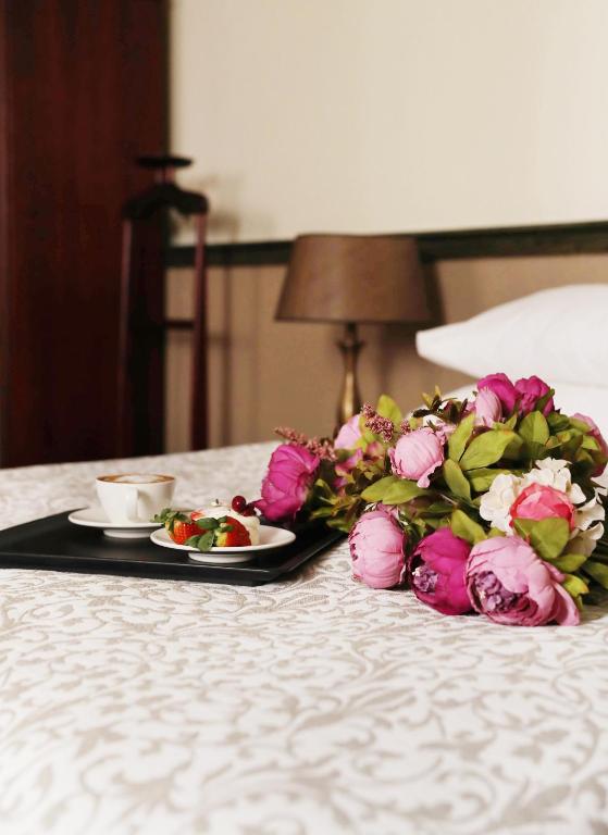 Postel nebo postele na pokoji v ubytování Old Riga Boutique Hotel "Vecriga"