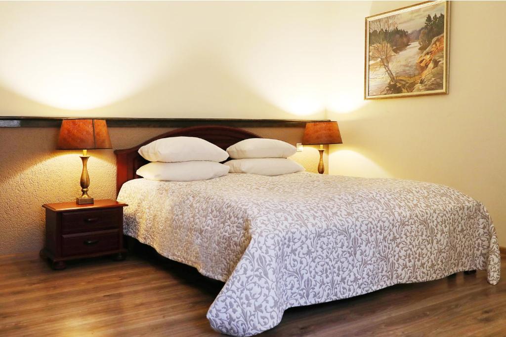 Postel nebo postele na pokoji v ubytování Old Riga Boutique Hotel "Vecriga"