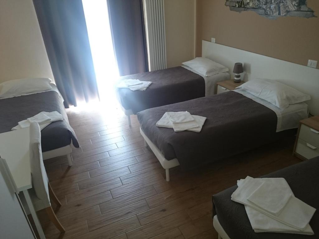 Postel nebo postele na pokoji v ubytování Civico 28