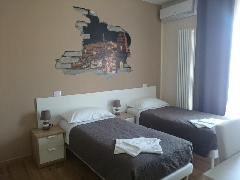 Postel nebo postele na pokoji v ubytování Civico 28