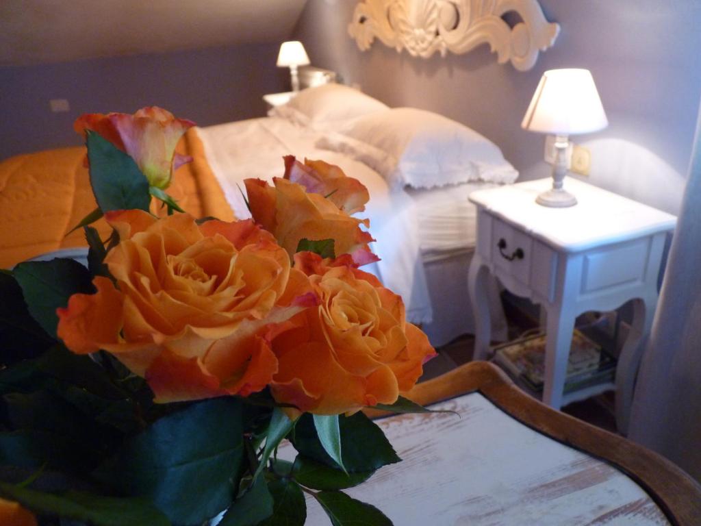 Posteľ alebo postele v izbe v ubytovaní B&B The Roses Garden