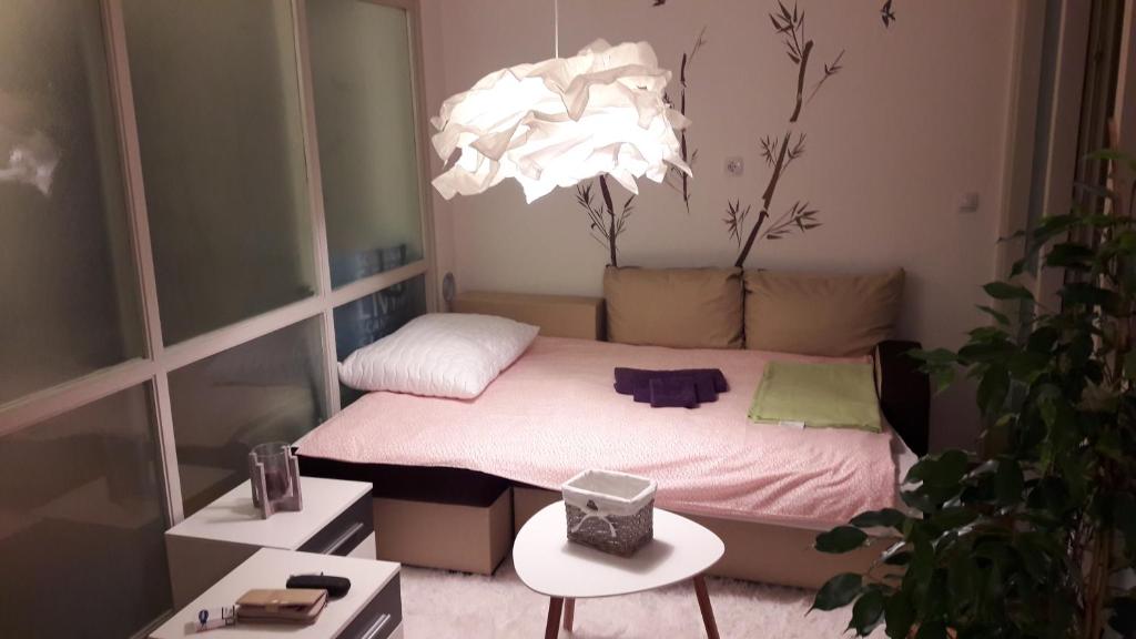 Posteľ alebo postele v izbe v ubytovaní Apartment Melon