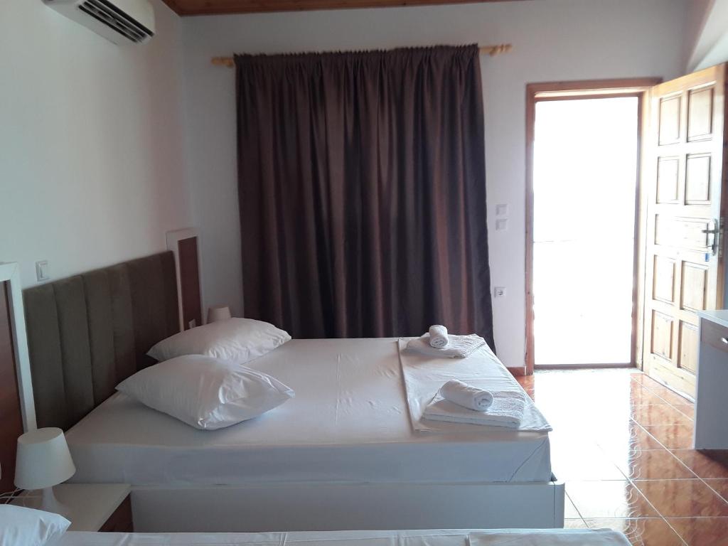 Postel nebo postele na pokoji v ubytování Hotel Riviera