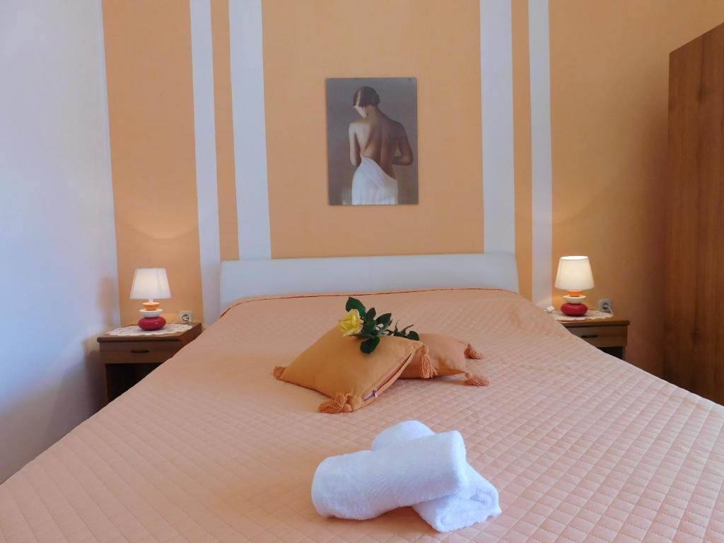 Postel nebo postele na pokoji v ubytování Apartments & Rooms Vitt