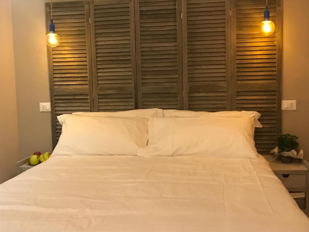 Posteľ alebo postele v izbe v ubytovaní Hotel Raphael