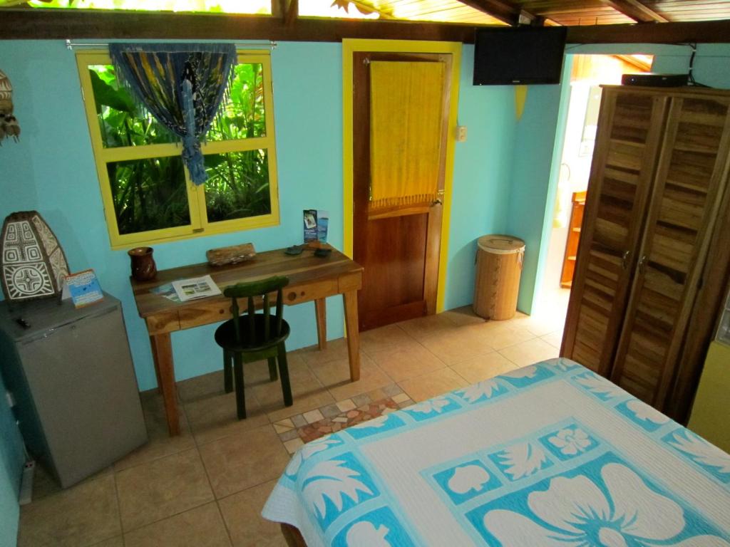 Postel nebo postele na pokoji v ubytování Physis Caribbean Bed & Breakfast