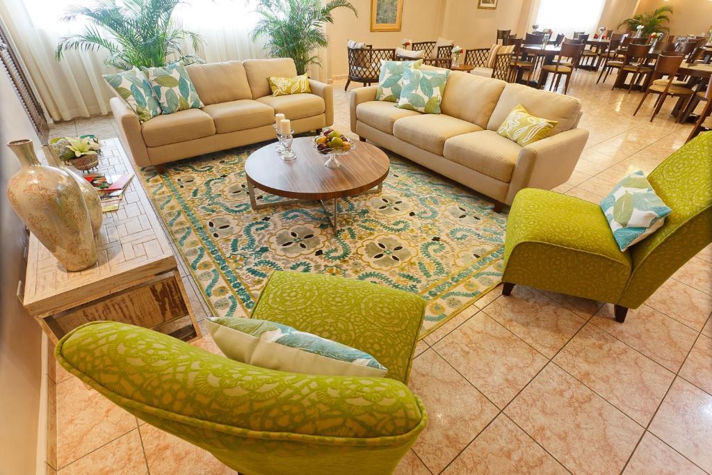 Un lugar para sentarse en Hotel Coral Suites