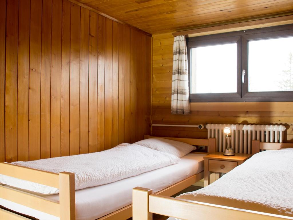 Postel nebo postele na pokoji v ubytování Refuge de Plan-Francey