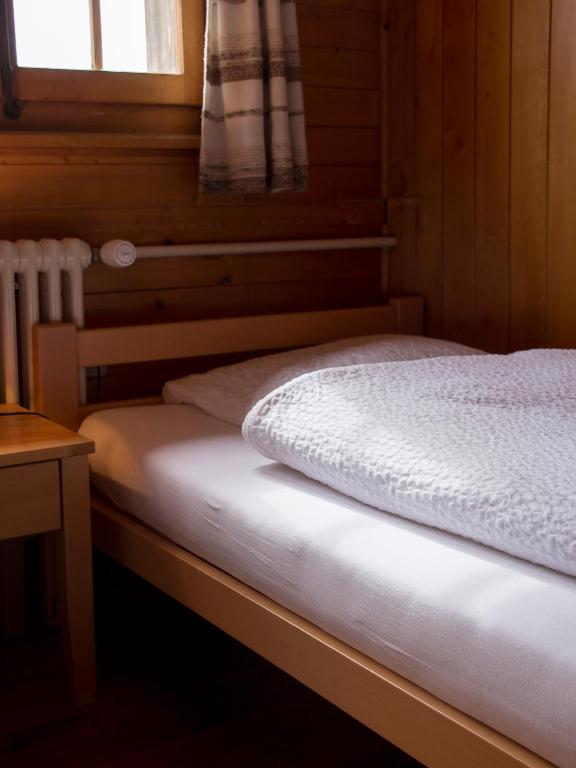 Postel nebo postele na pokoji v ubytování Refuge de Plan-Francey