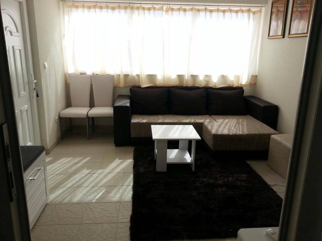 Χώρος καθιστικού στο Kartini Apartment