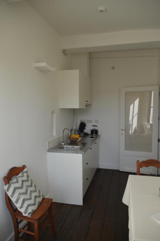 Kuchyň nebo kuchyňský kout v ubytování B&B In den Roden Schilt