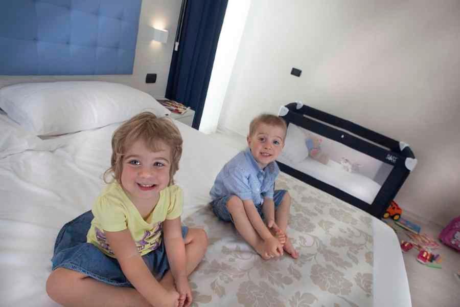 Postel nebo postele na pokoji v ubytování Hotel Rio Bellaria