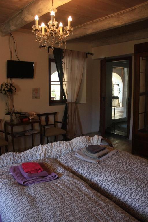 Postel nebo postele na pokoji v ubytování Affittacamere Casa Archi