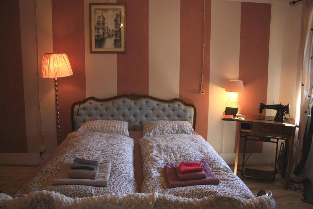 Postel nebo postele na pokoji v ubytování Affittacamere Casa Archi
