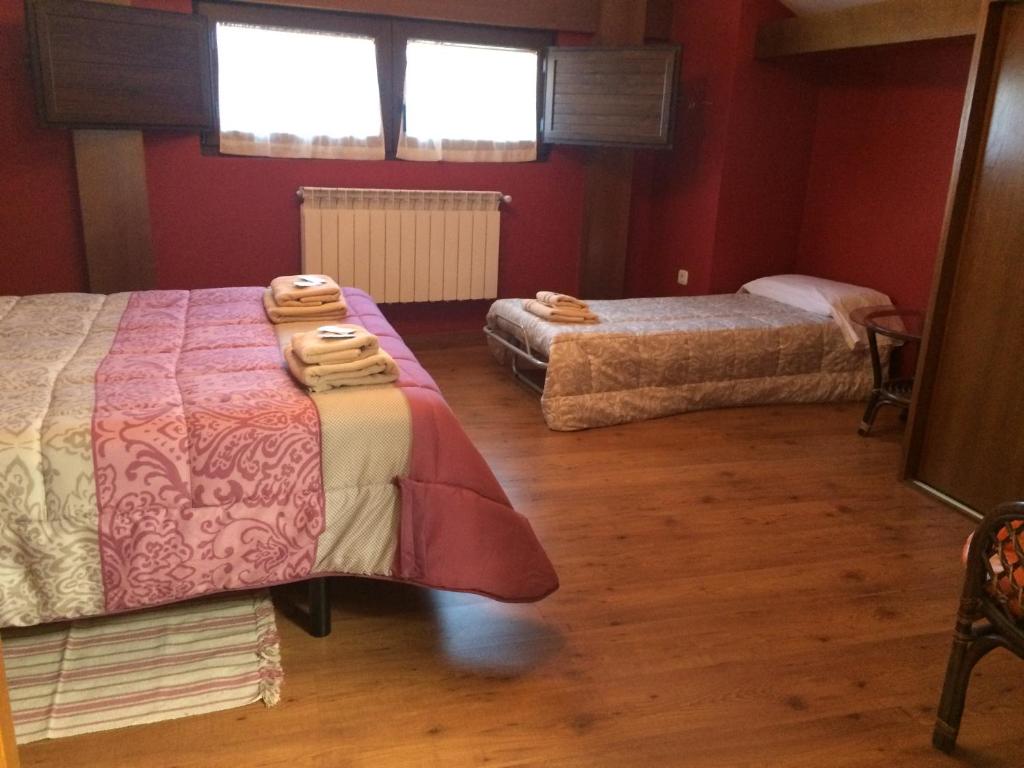 Postel nebo postele na pokoji v ubytování Tía María