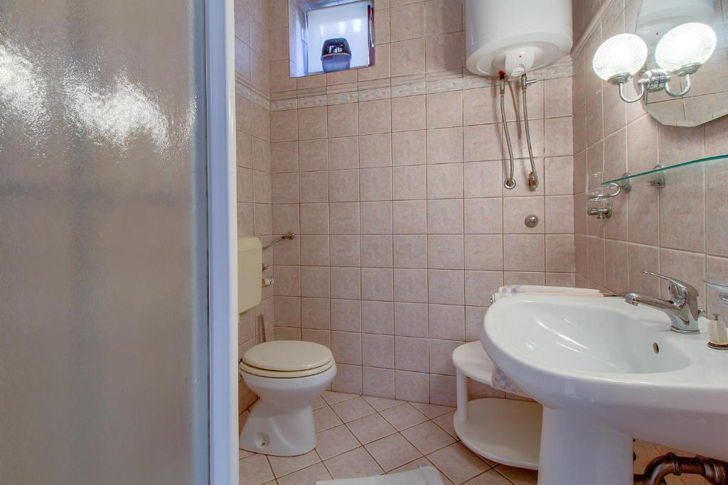 Kúpeľňa v ubytovaní Apartman Haraciceva